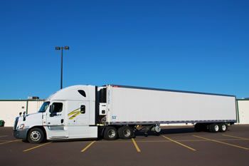 Swift Transportation tractor trailer parked in a parking lot